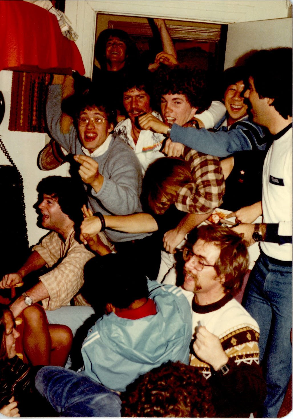 Upsilon brothers gathered for a group photograph in the 1980s