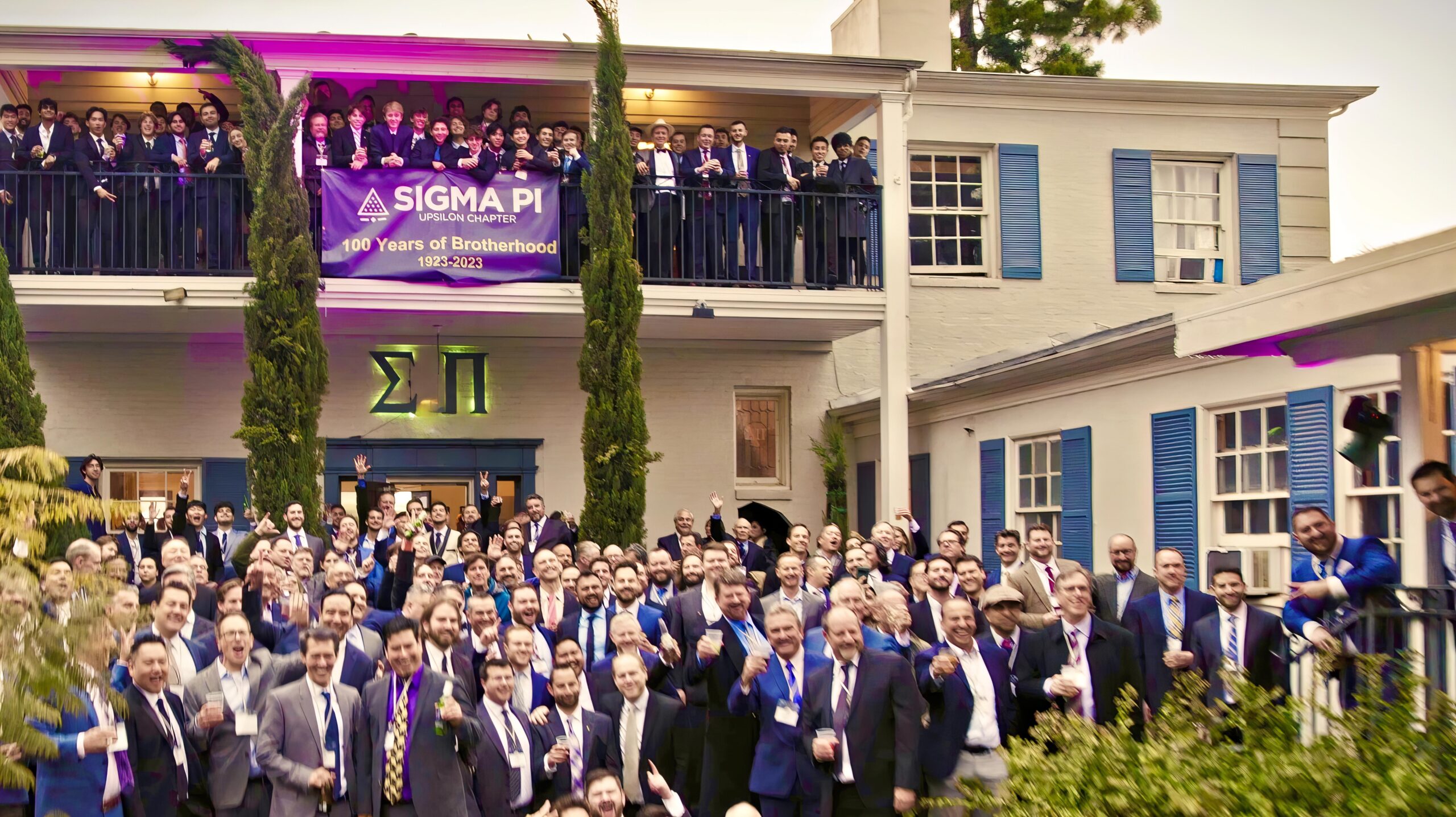 Upsilon brothers celebrating the chapter’s 100th anniversary at 612 Landfair